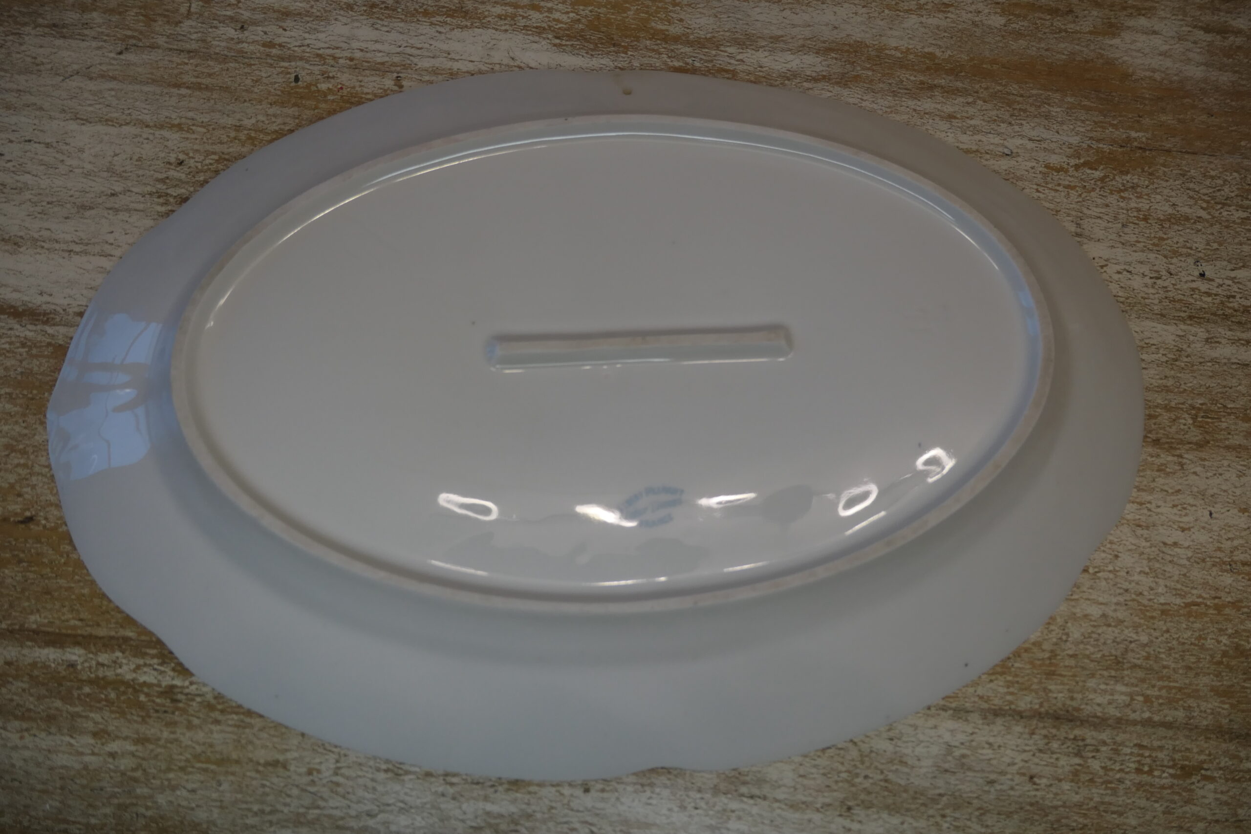 Plat ovale en porcelaine de Limoges Jaune
